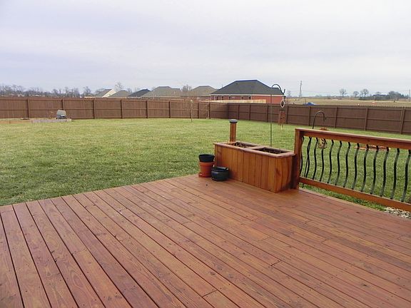 Fenced Backyard with Deck