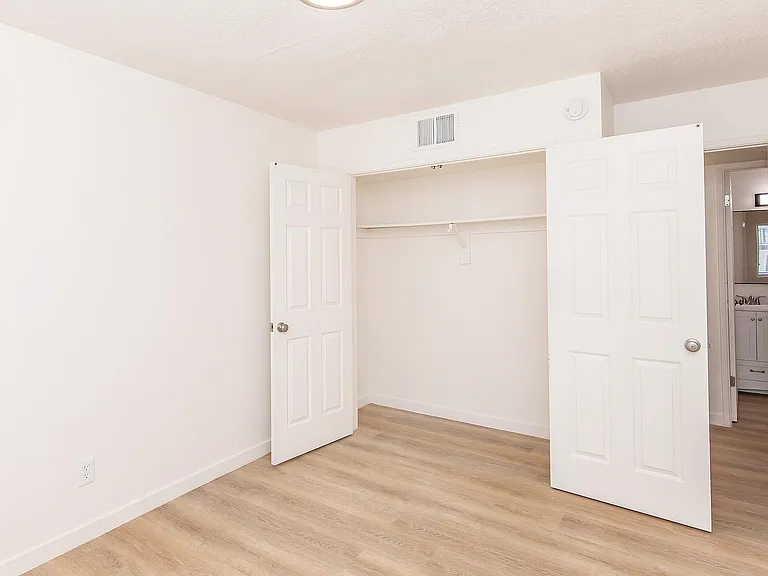 Bedroom, hardwood floors, ample closet