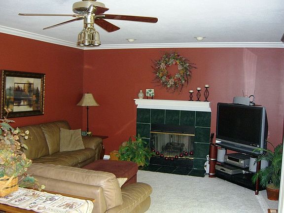 Spacious Great Room With Ceramic Fireplace & Mantle.