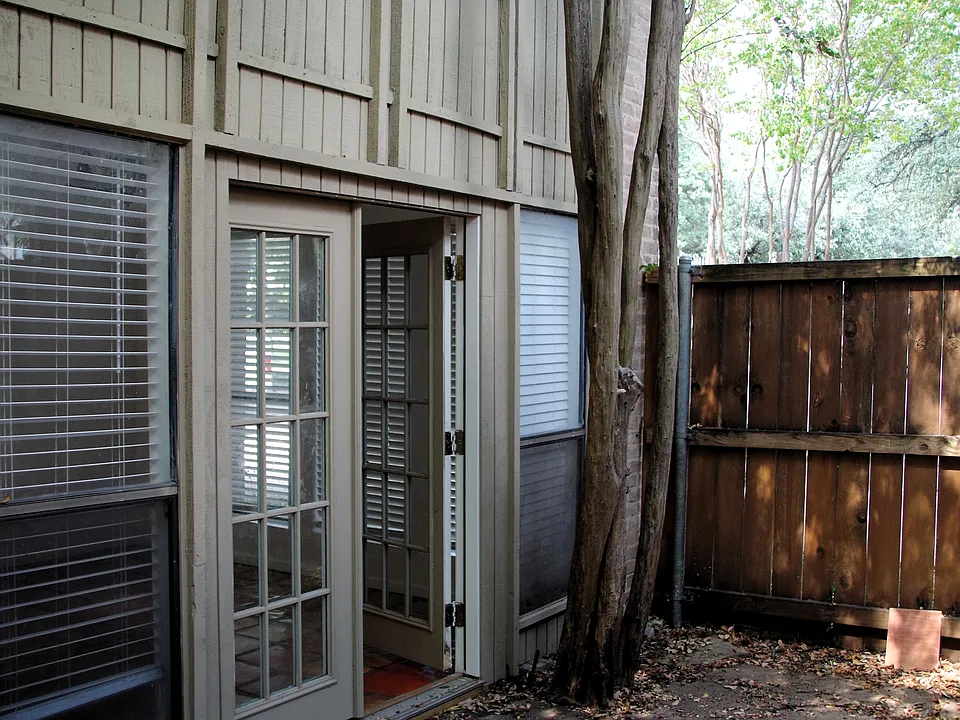 fenced in patio looking to McFarlin
