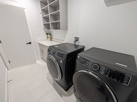 In-unit laundry and storage room