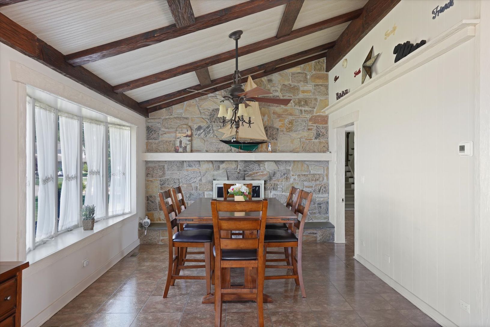  Dining with stone fireplace