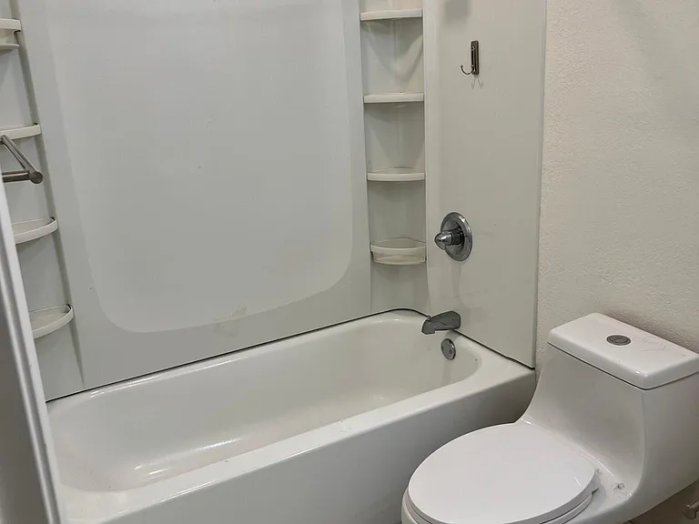 Bathroom has updated shower/tub!