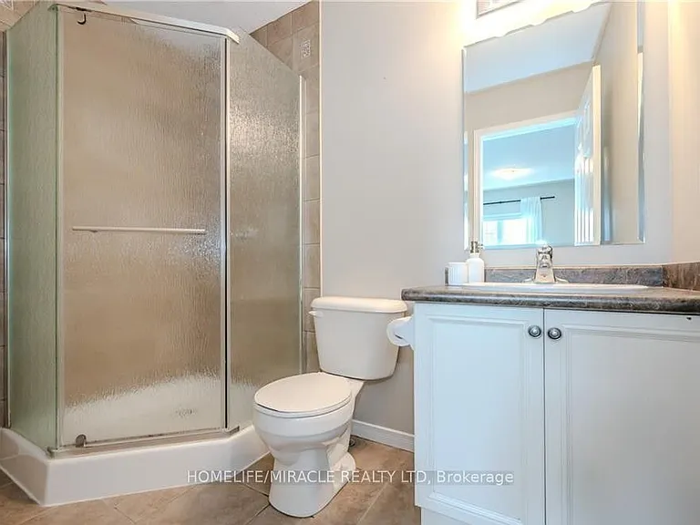 312 Tagge Cres — Photo 8