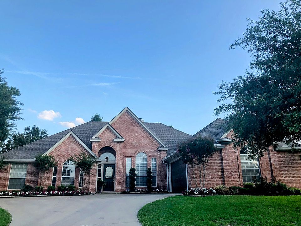 Front of House with attached two car garage.