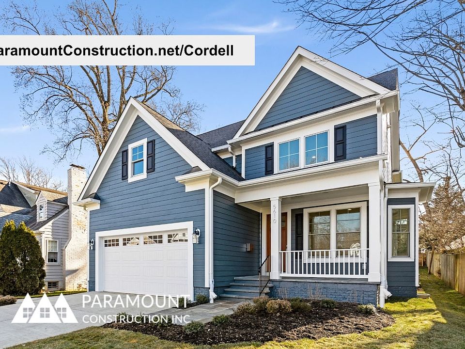Covered porch, layered rooflines, quiet confidence
