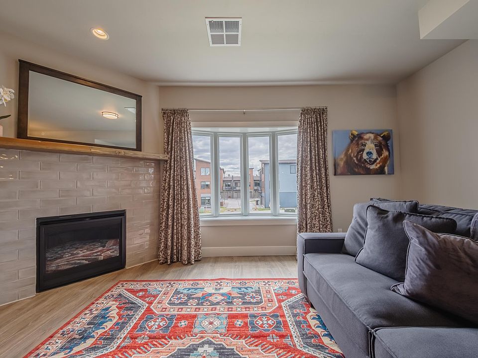 Living Room Fireplace and Bay Window.