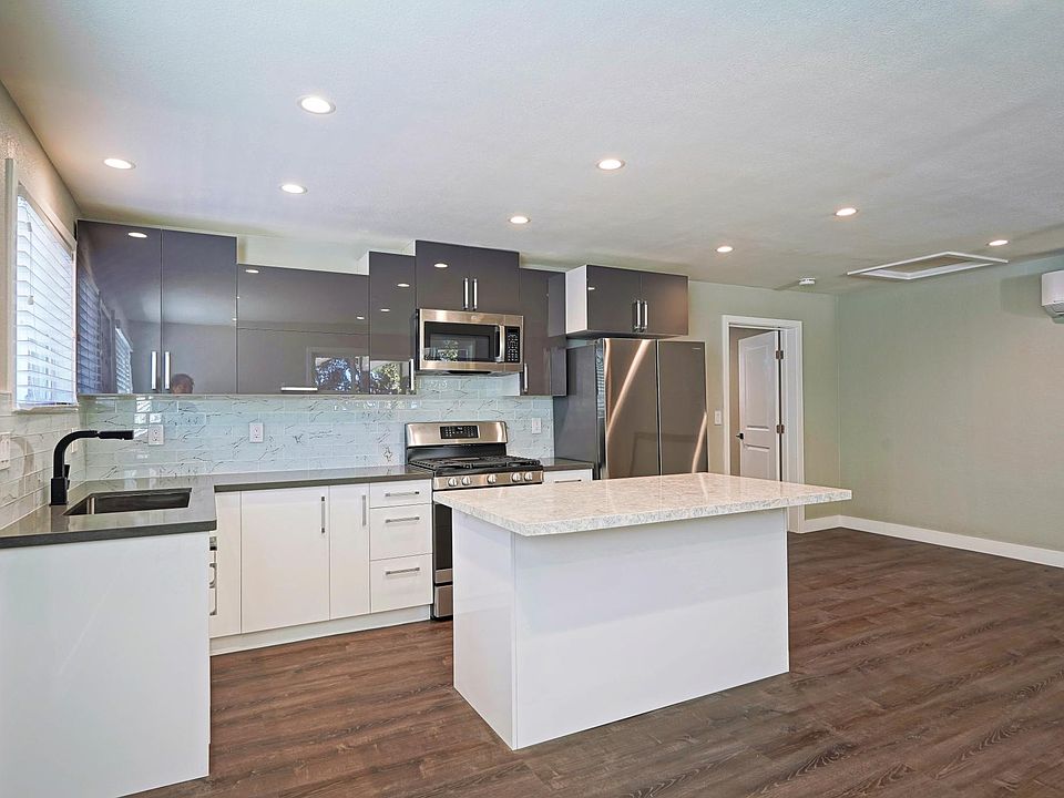 Spacious and Modern, newly renovated kitchen opens to Great Room.