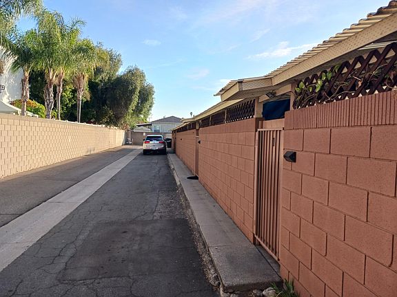 Alley with patio gates. Apt #4 is at the end before the right turn to the garages.