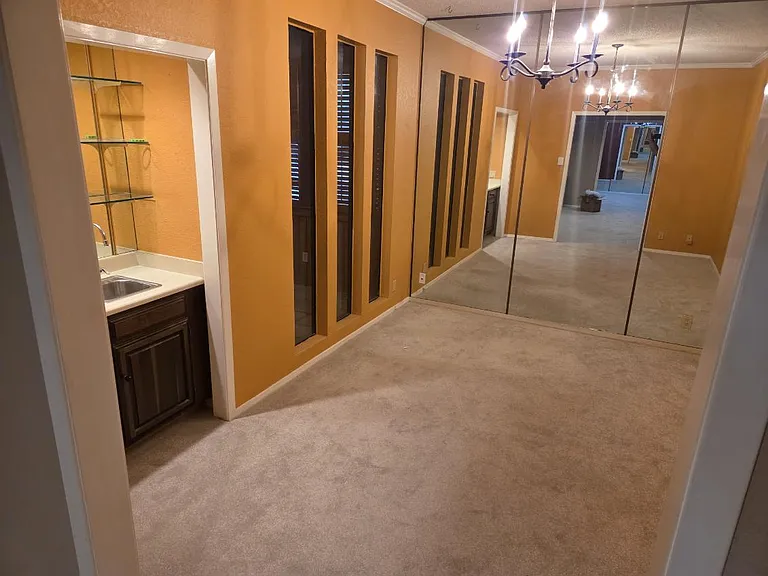 Formal dining or study with wet bar and dimming lights