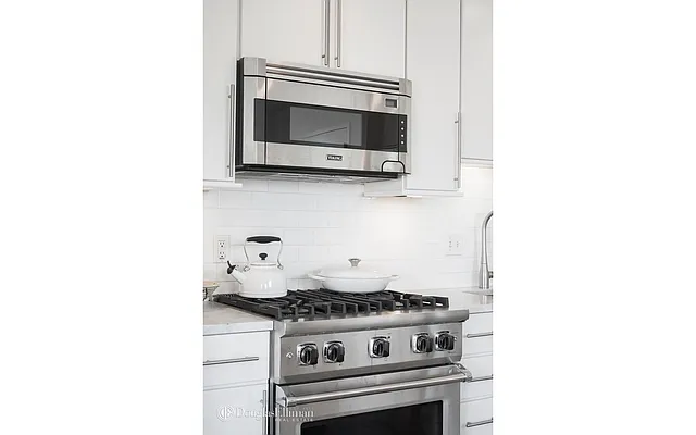 Sold by Douglas Elliman | media 13