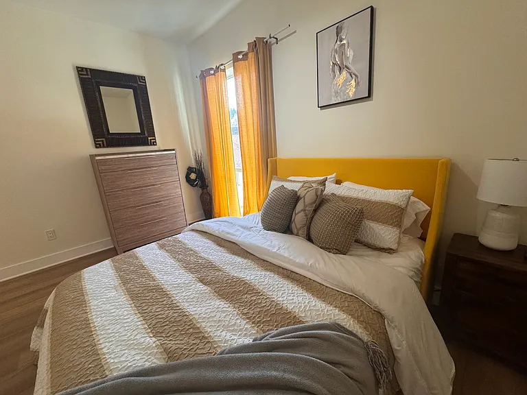 Queen bed in bedroom 3