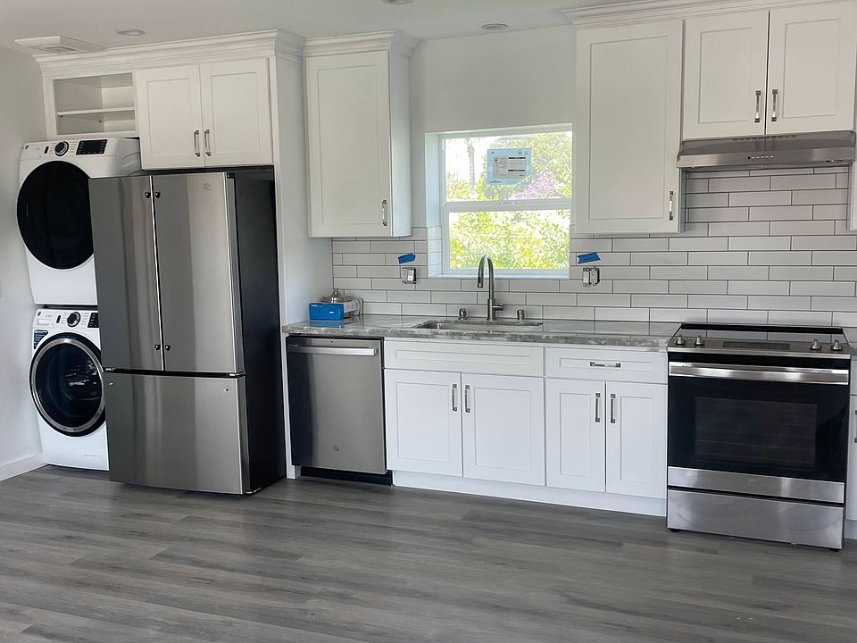All new kitchen with refrigerator, range, dishwasher and in unit washer dryer