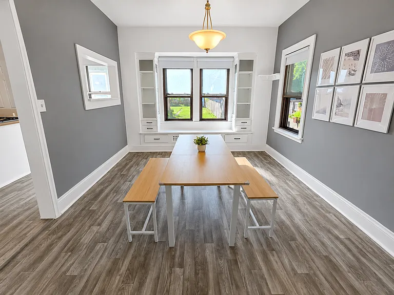 Dining area with built-in storage and natural light