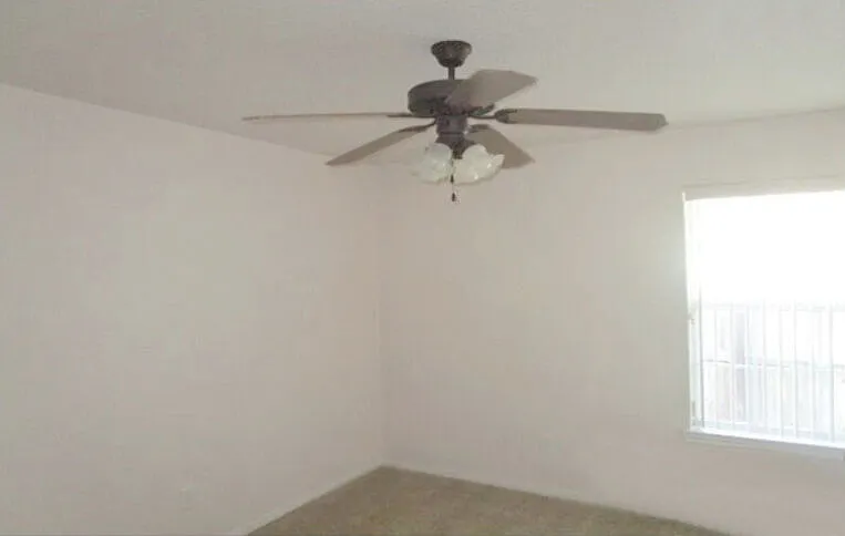 Bedroom #4 with ceiling fan/light.