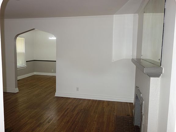Looking from entry into Living room with hardwood floor.