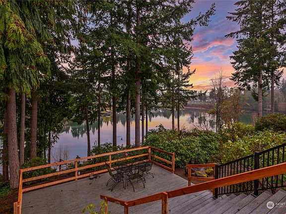 Enjoy the amazing views off the deck! Additional lower deck you see here expands the outdoor space for entertainment.>