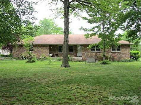 Front view of home; all brick exterior.