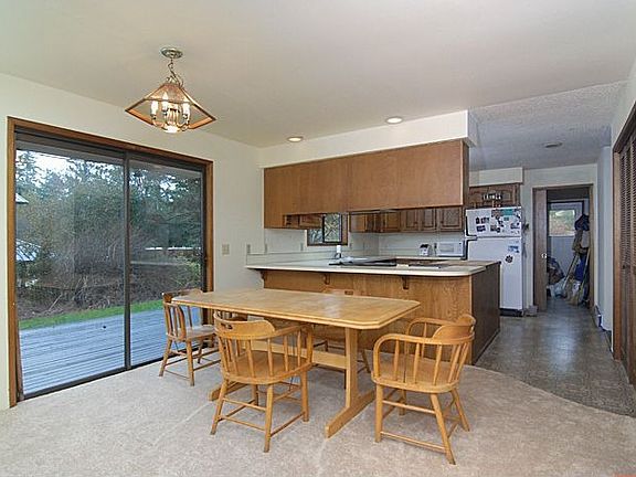 Dining room opens onto spacious deck.