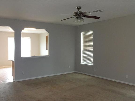 There is a spacious family room which is open to the huge kitchen and breakfast area.