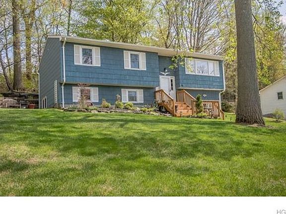 Beautifully landscaped and generous front yard.