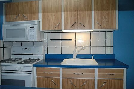 Custom Ash Cabinet doors, Amana Appliances  Italian designer counter tops