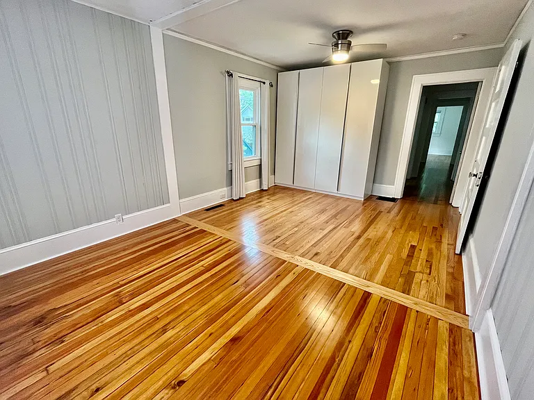 Large wardrobes provide plenty of storage space.