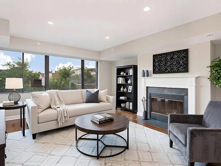 1633 Q living area with fireplace (virtually staged)