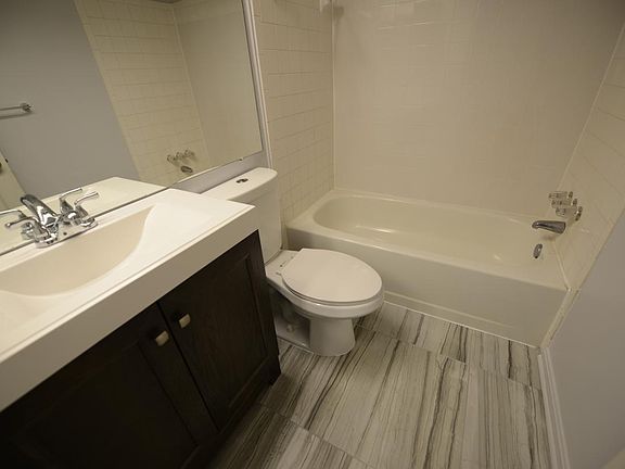 Toilet with brand new ceramic tiles, wc, and basin