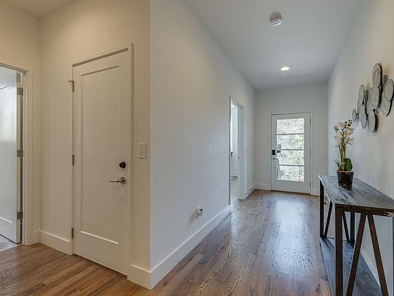 entry, office first door on the left, garage door second door on the left, laundry room third door on the left