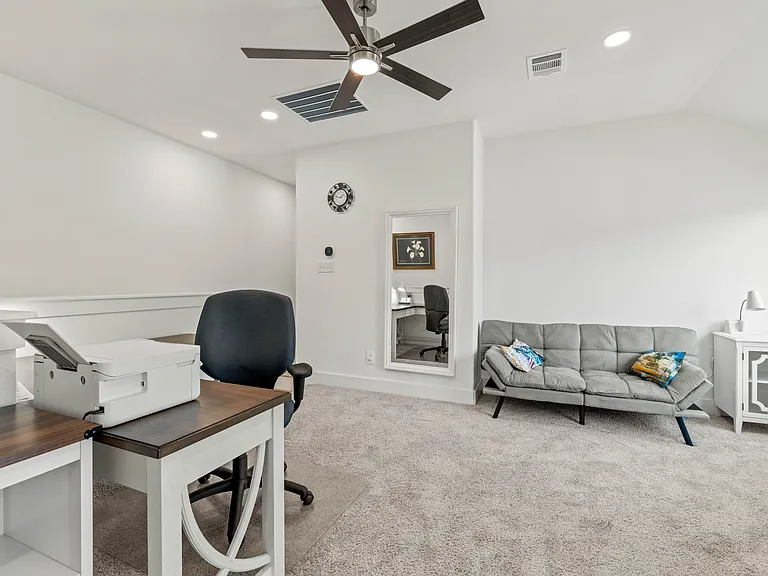 The dedicated workspace also offers a desk, chair, wifi printer and bookcase - perfect for working from home!