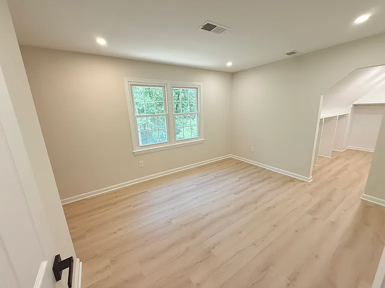 Upstairs bedroom 2 with walk-in and nook for bed or desk