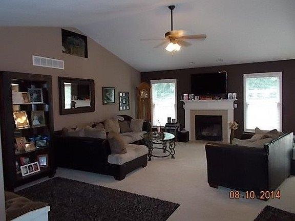 Main living room
						:
						Lg beautiful main living room,tall ceilings, gas fire place W/neutral colors.