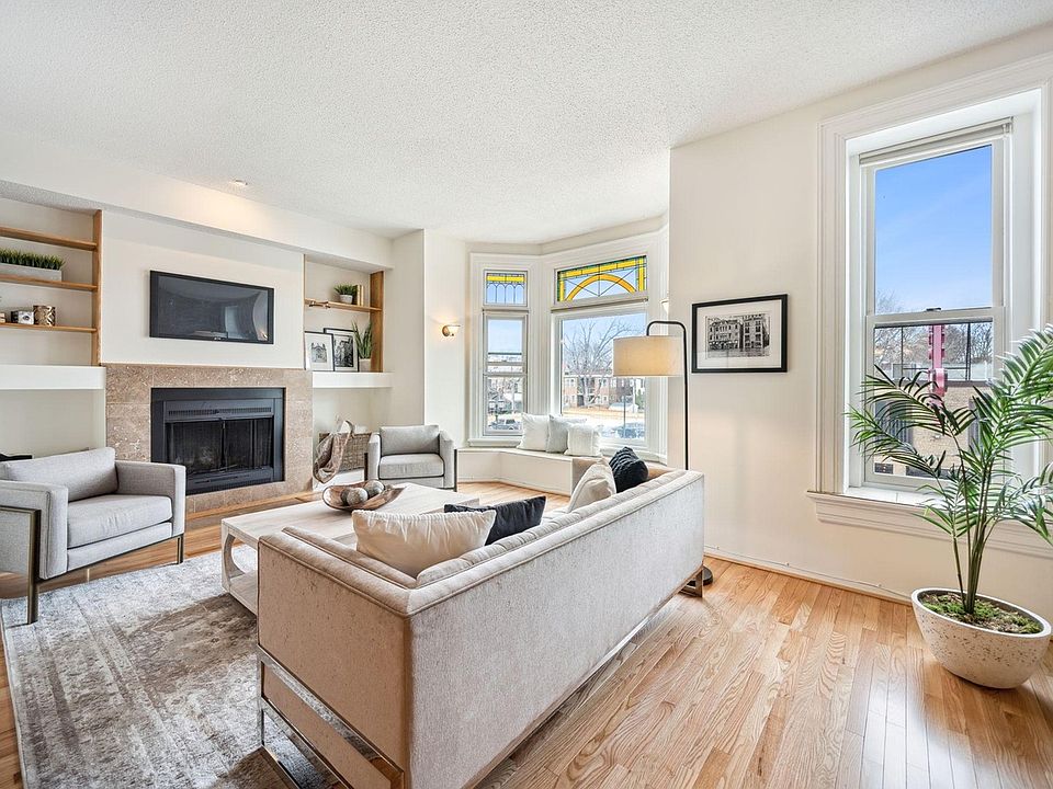 Unit unfurnished, shown with staged furniture