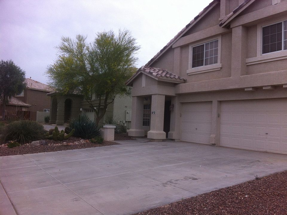 Front of House with 3 car insulated and air conditioned garage