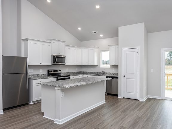 The kitchen comes with stainless steel appliances