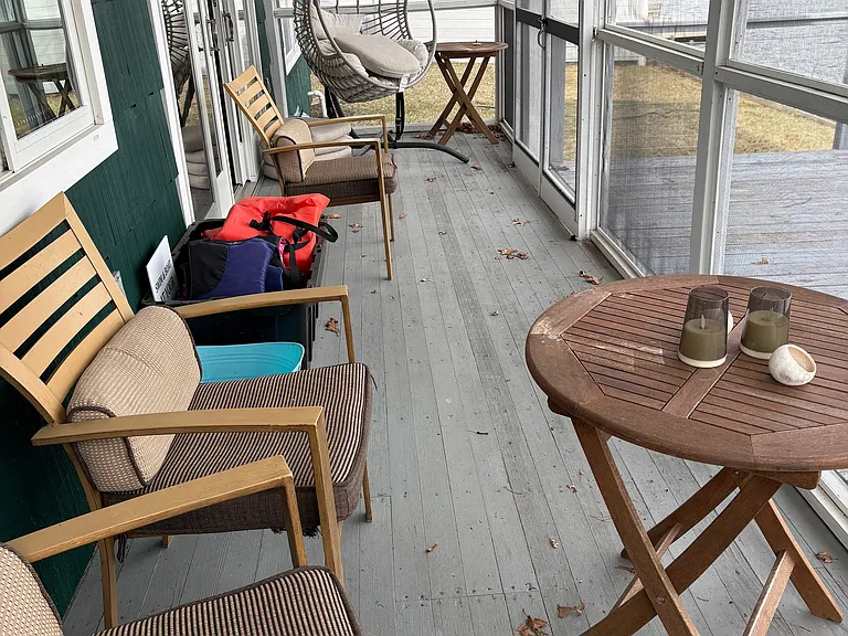 Inside screen porch plus life preservers,