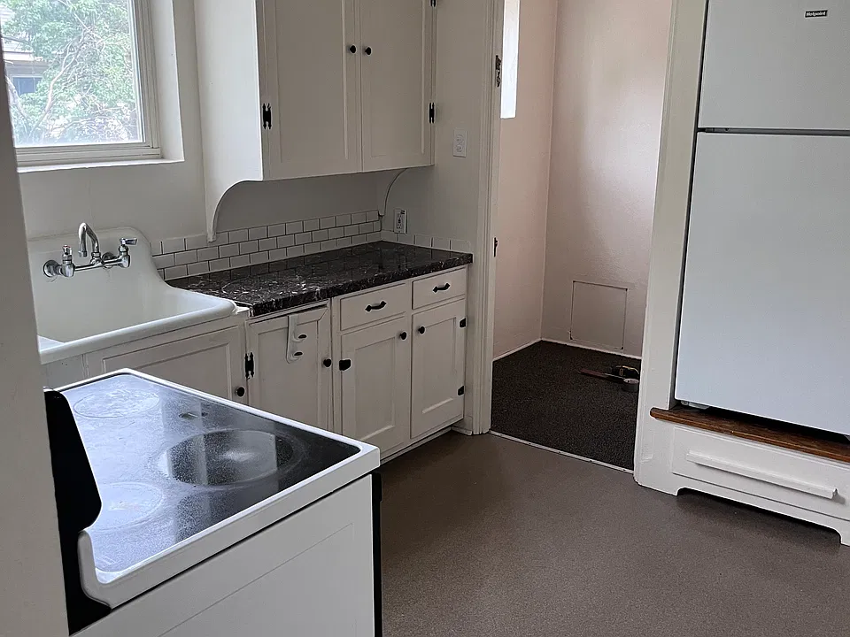 Kitchen , refrigerator, stove and large pantry - not shown here