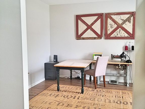 Office space just to the right of the front door.