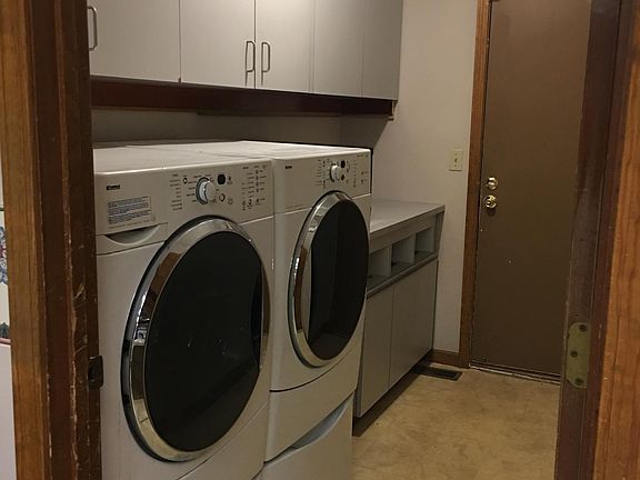 Laundry room to die for, clothes sorting bins and all