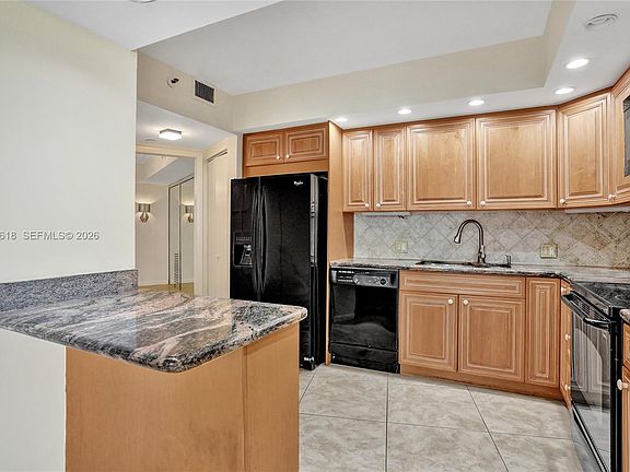 2nd image of 20281 E Country Club Dr APT 2110