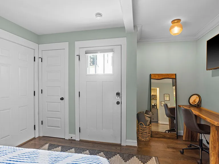 Closet space for storage and desk/work area.