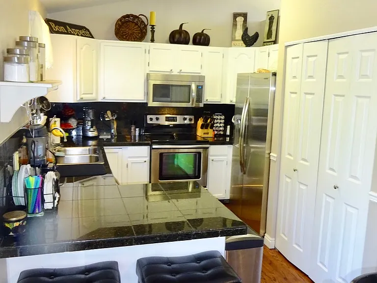 6473 S Tabor Ct — Photo 7