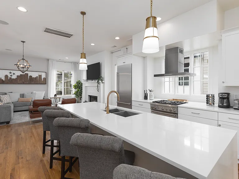 Fully equipped kitchen with stainless steel appliances, seating for 5 at the kitchen island, additional seating at the dining room table and all the dishware / utensils you might need.