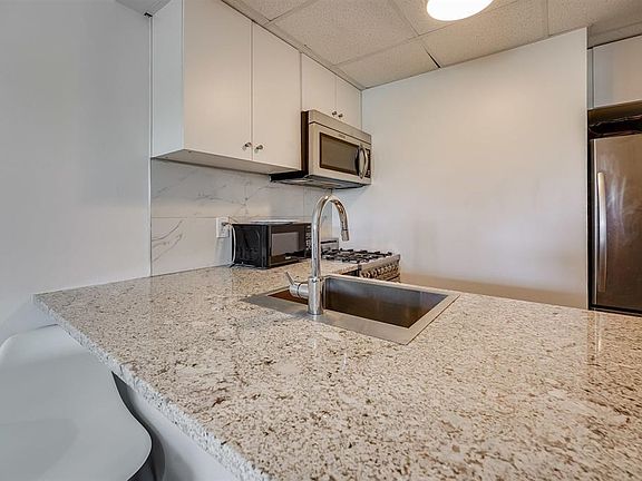5th image of 227 Christopher Columbus Dr APT 308B