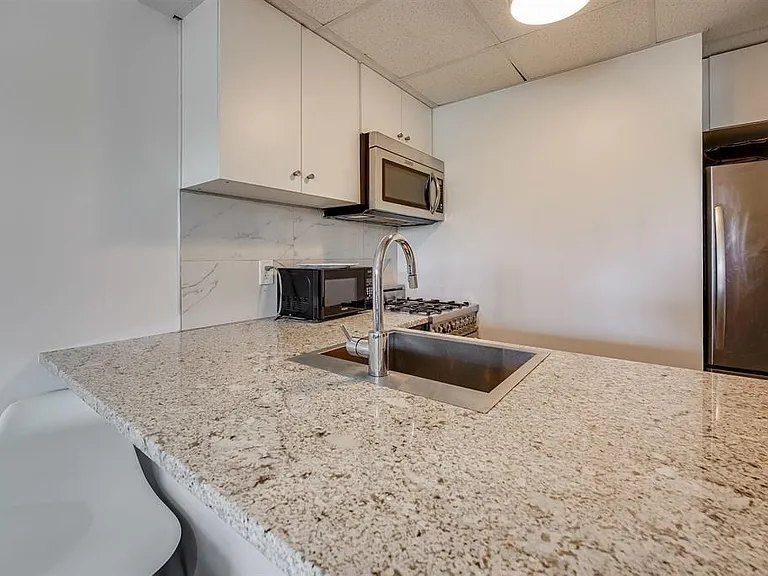 227 Christopher Columbus Dr #308B — Photo 5