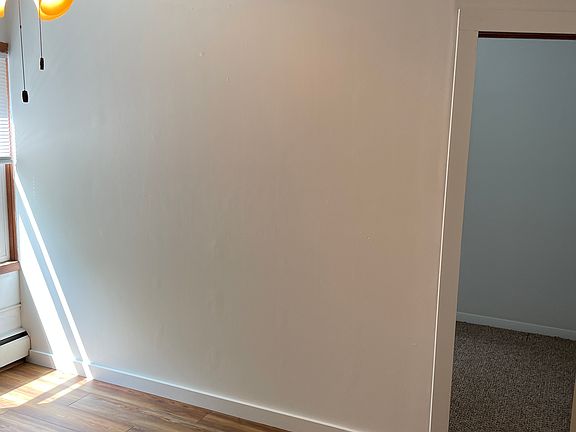 Living room with view into the study