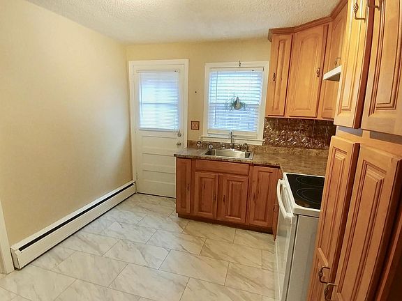 Kitchen has room off to the side that can be dining room, office, or a 3rd bedroom.