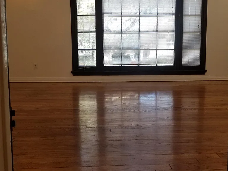 LARGE FRONT WINDOW IN LIVING ROOM OVERLOOKING CLOVERDALE AVE.