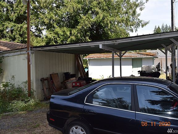 2 vehicle carport with storage 